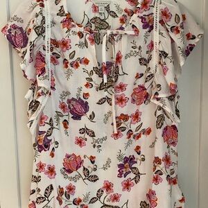 Lucky flirty floral top.  White with pinks. Light weight. Keyhole neck.